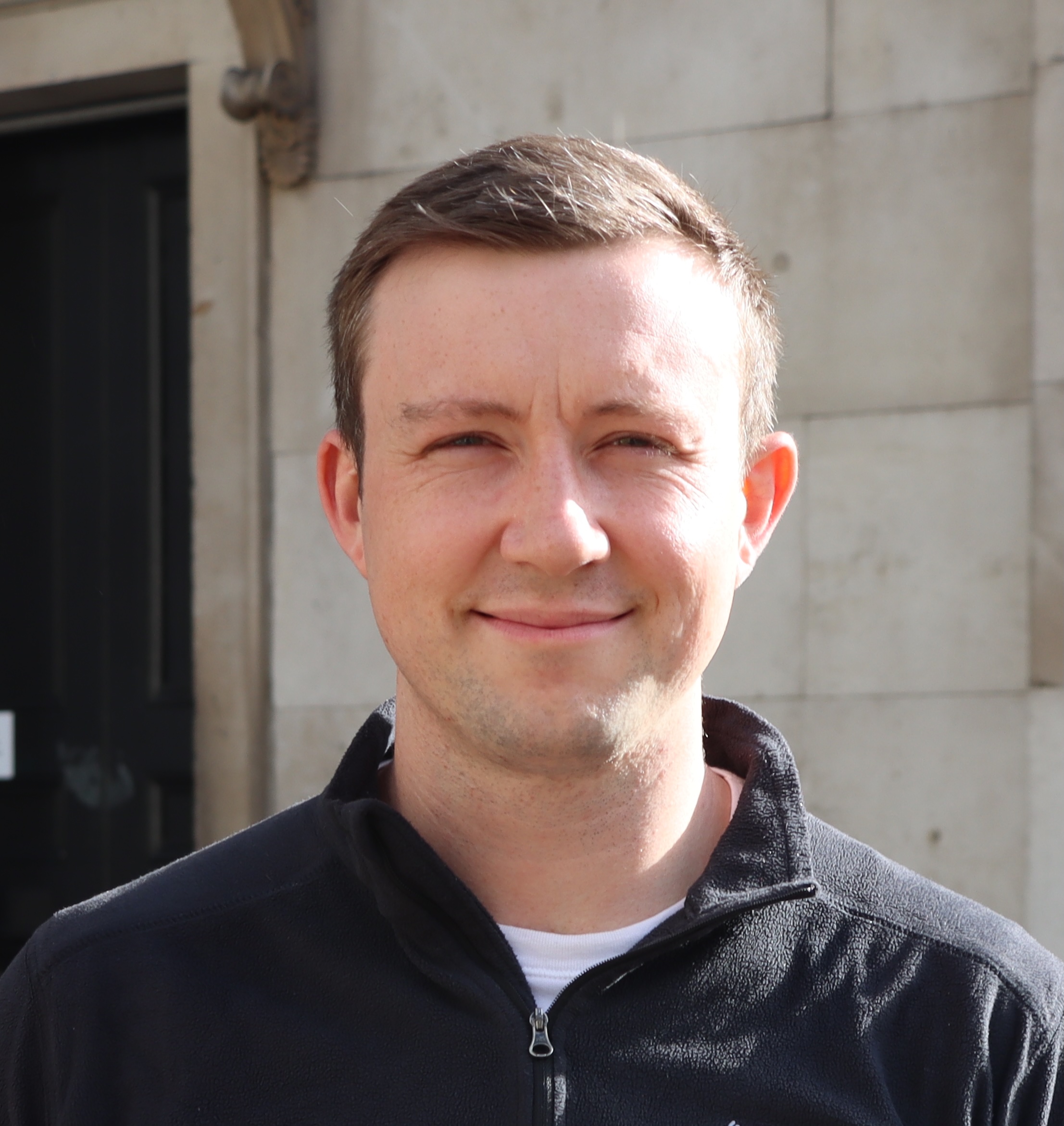 Headshot of Hamish Gibbs